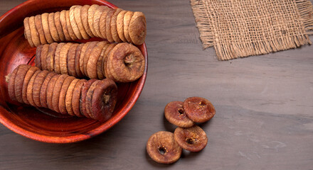 Fresh Figs or Anjeer fruit healthy vegan food concept organic dry fruits on wooden background.