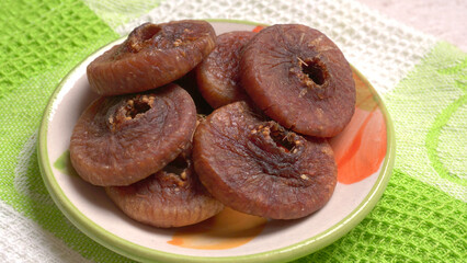 Fresh Figs or Anjeer fruit healthy vegan food concept organic dry fruits on wooden background.