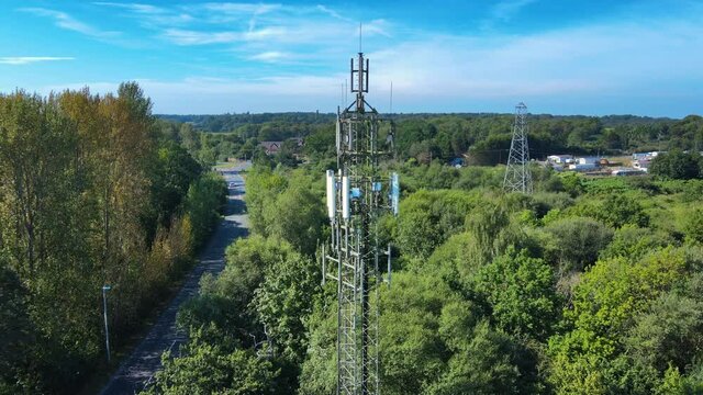 Aerial shot circling around 5G mast