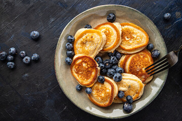 pancakes with blueberries fresh breakfast sweet dessert fresh portion ready to eat meal snack on the table copy space food background rustic. top view