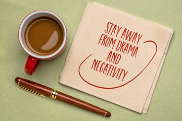 stay away from drama and negativity - inspirational handwriting on a napkin with a cup of coffee, positivity, self care and personal development concept