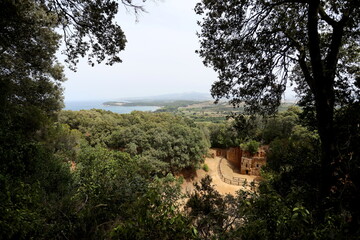View of the Gulf of Baratti with the Etruscan Necropolis of the Caves - Populonia. Archaeological...
