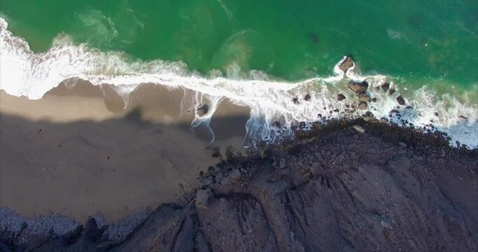 Aerial: ocean and cliff,  Pacifica, San Francisco
