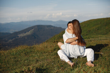 Couple walk in the mountains