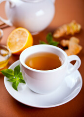 Refreshing ginger tea with lemon, mint leaf and honey