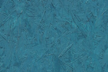 blue dark wood texture of a piece of plywood in the wall