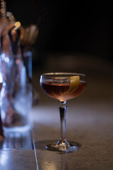 Delicious elegant orange cocktail in top bar restaurant in bogota colombia