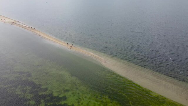 Drone aerial panning around Rawa Peninsula on Baltic Sea in Poland.