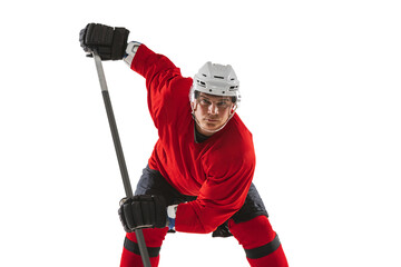 Portrait of professional male hockey player training isolated over white background