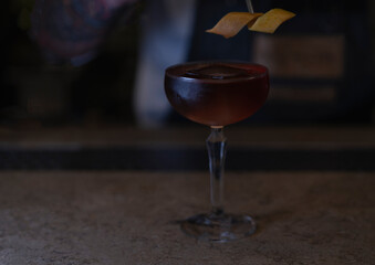 Delicious elegant orange cocktail in top bar restaurant in bogota colombia