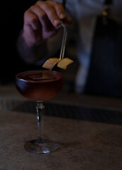 Delicious elegant orange cocktail in top bar restaurant in bogota colombia