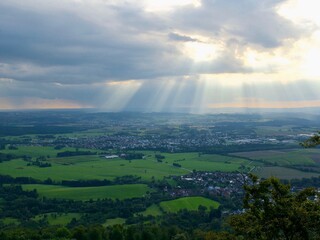 a view from the hill to the green valley on a cloudy day in the south of Germany