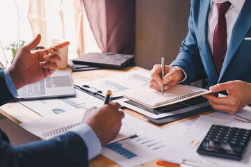 Fototapeta premium Business team meeting, presentation and brainstorming to making a profit of company collaboration discussing working analyzing with financial data and marketing business strategy project