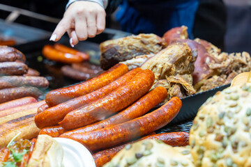 assorted meat sausages beer snack, street food holiday market