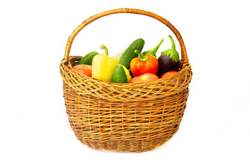 Wicker basket with fresh vegetables