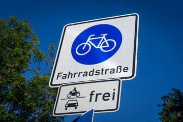 bicycle sign which shows the beginning of a special bicycle street. Cars and motorbikes are also...