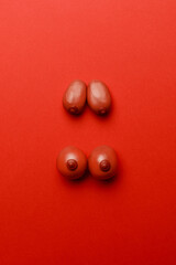 Woman breast before after from clay as a breast plastic surgery concept