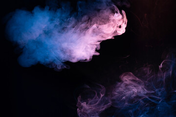 Blue and pink steam on a black background.