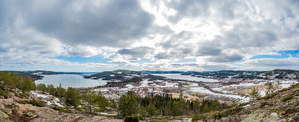 Winter panorama landscape with forest, trees covered snow and seaside mountains. Touristic place winterly morning of a new day.