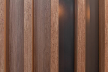 Vertical texture made with wood for apartment or house decoration.