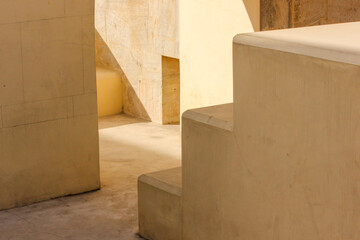 Abstract patterns in the vintage stairs inside the ancient astronomical observatory of Jantar Mantar in the city of Jaipur in Rajasthan, India.