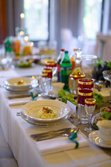 The elegant dinner table. Wedding table setting.
