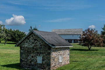 Fototapeta na wymiar Ice House and Barn, The Josiah Benner Farm, Gettysburg National Military Park, Pennsylvania, USA