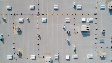 drone view of a commercial roof top - obrazy, fototapety, plakaty
