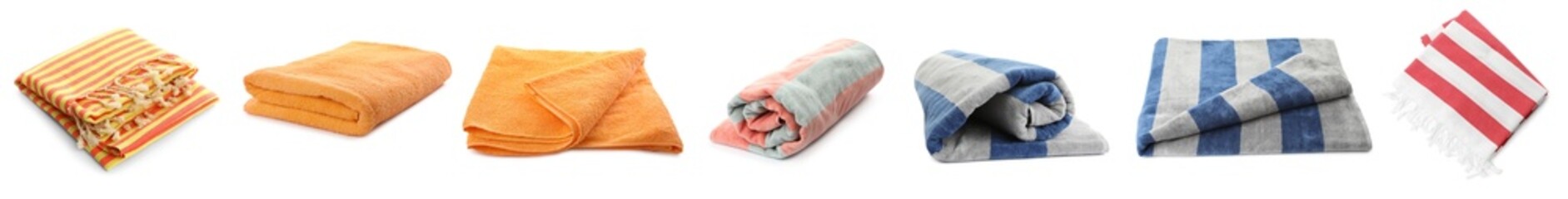 Set with different beach towels on white background. Banner design