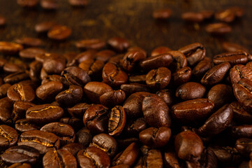 Natural background for Cafe menu or brochure template - macro photo of brown roasted coffee beans, close up