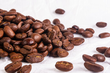 Natural background for Cafe menu or brochure template - macro photo of brown roasted coffee beans, close up