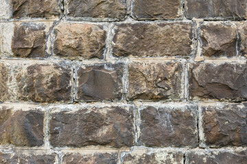 Stone wall background. Stone masonry. Texture of a stone wall.