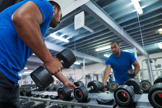 Fit weightlifter at gym