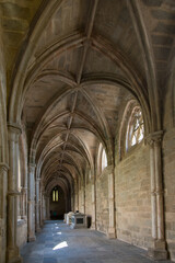 Gothic arches at Cloister of Evora Cathedral. No people. Portugal, Europe