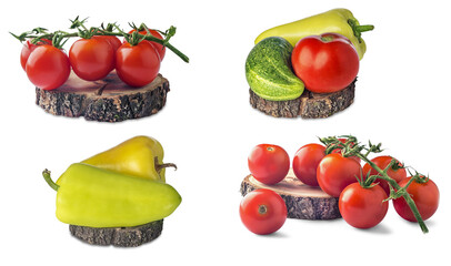 branches of red tomatoes and bell peppers on a wooden board
