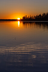 Fototapeta premium Colourful Sunset at Astotin Lake, Elk Island National Park