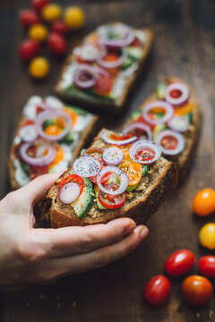 Vegetarian sandwiches toasts with avocado and cherry tomatoes