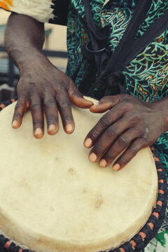 A Drummer playing his samba drum