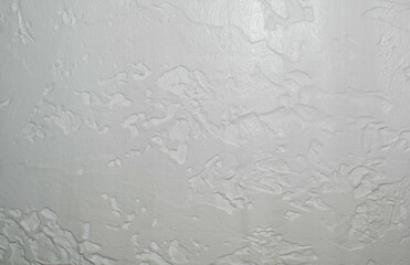 wall with decorative plaster embossed light gray for design
