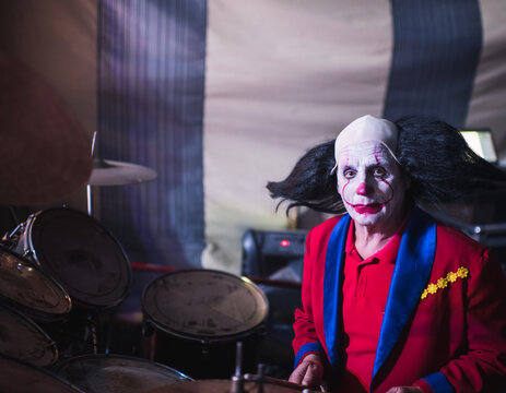 Clown Playing Drums
