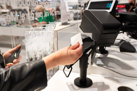 Close Up Of Payment At Clothing Shop
