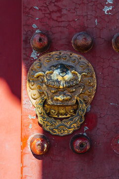  ancient red gate and lion door knocker