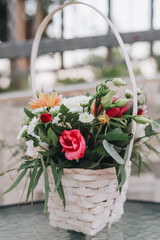 
Wedding bouquet of flowers in a basket