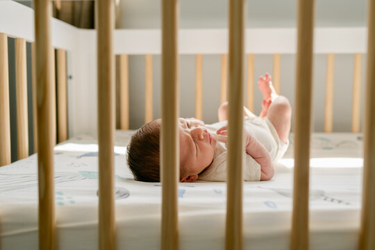Baby alone in his crib