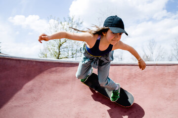 Cool skater girl in a skate park