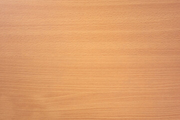 The texture of an orange wood countertop. Horizontal stripes.An empty space for the text.