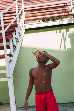 Teenager drinking from bottle