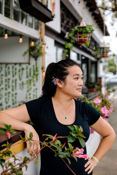Pretty woman with cochlear implant outdoors