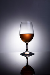 cognac or brandy glass isolated on gray white background with clipping path
