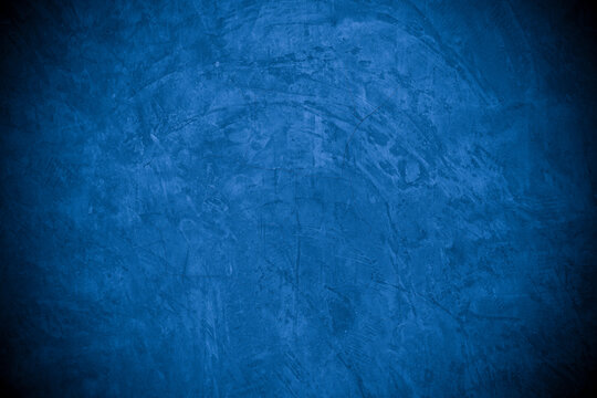 Old wall pattern texture cement blue dark abstract blue color design are light with black gradient background. © Kamjana